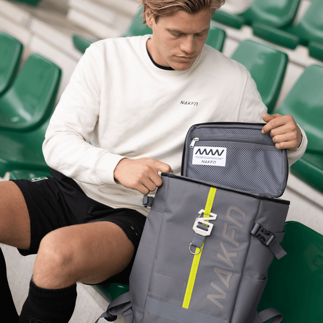 Naked Hockey | Naked Hockey The 20L Backpack | The 20L Backpack - Dark Grey | Total Hockey