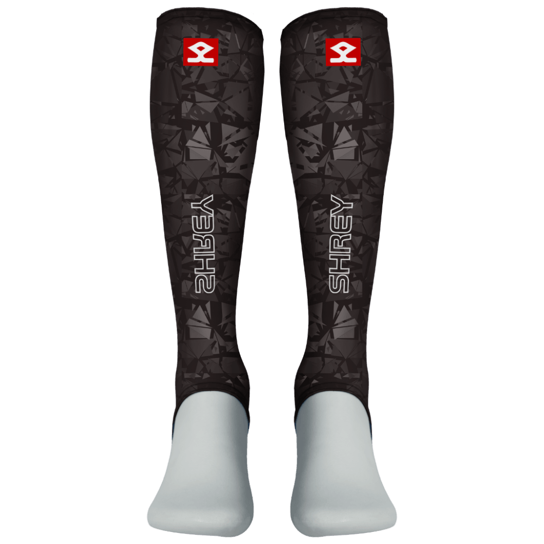 Shrey Hockey | Shrey Hockey Shin liners With Stirrup - Black | Shin liners With Stirrup - Black - Black / Senior | Total Hockey