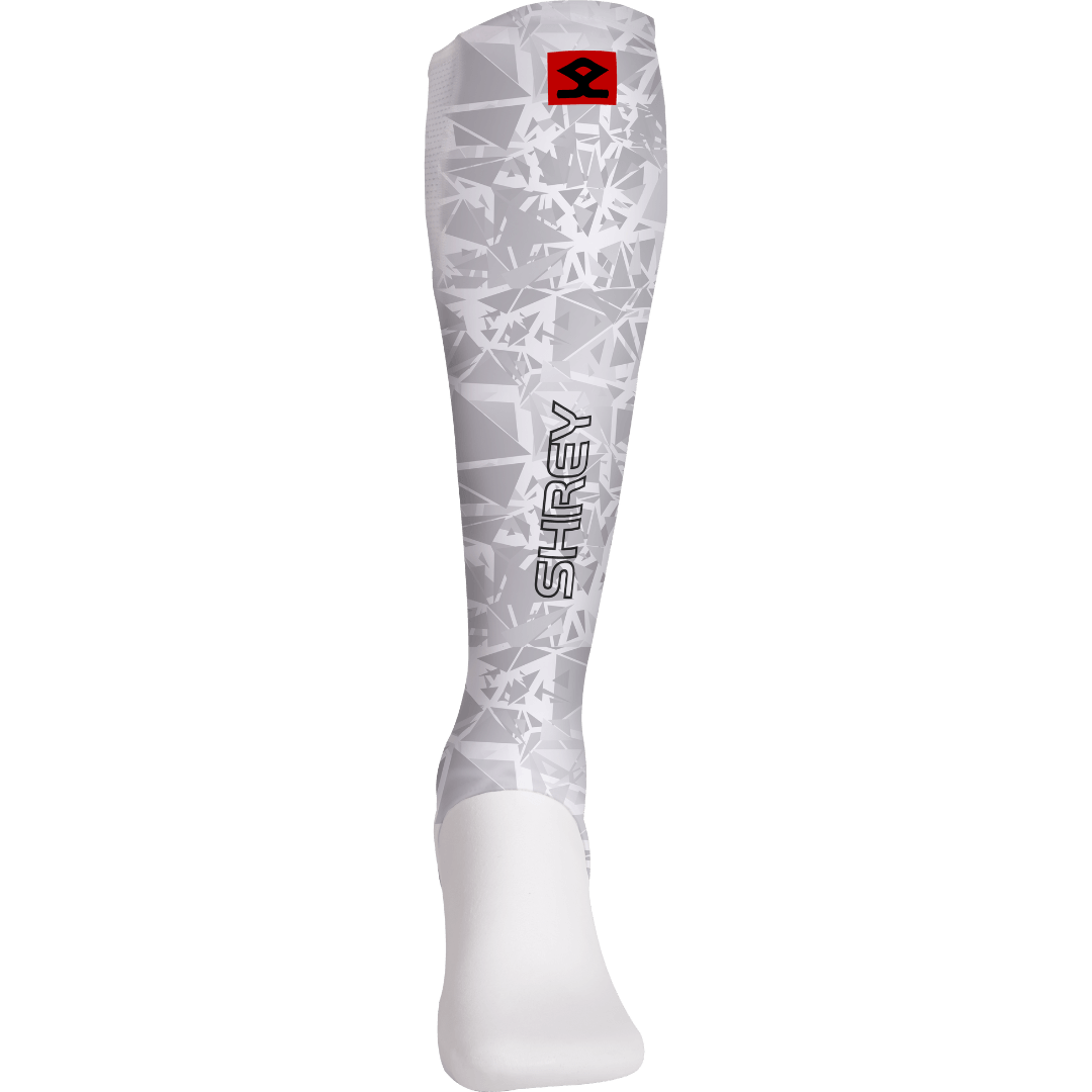 Shrey Hockey | Shrey Hockey Shin liners With Stirrup - White | Shin liners With Stirrup - White - White / Senior | Total Hockey